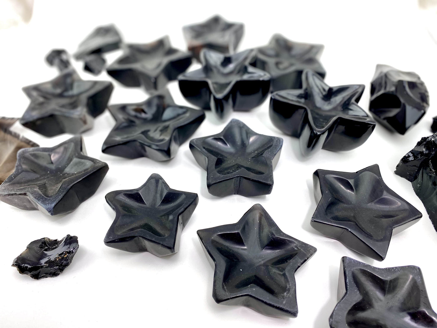 Black Obsidian Stone Star Dishes from a angle showing thickness