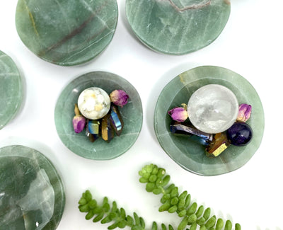 Green Aventurine Stone Round Dishes with crystals in them