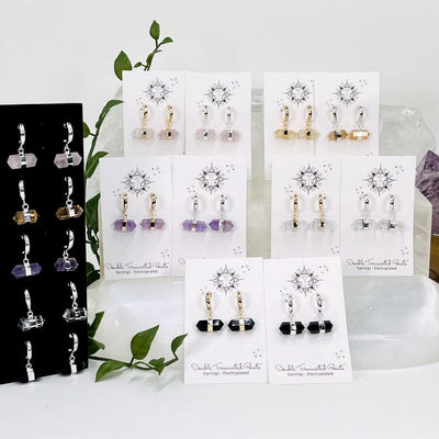multiple pairs of earrings displayed to show the differences in the stone options available 
