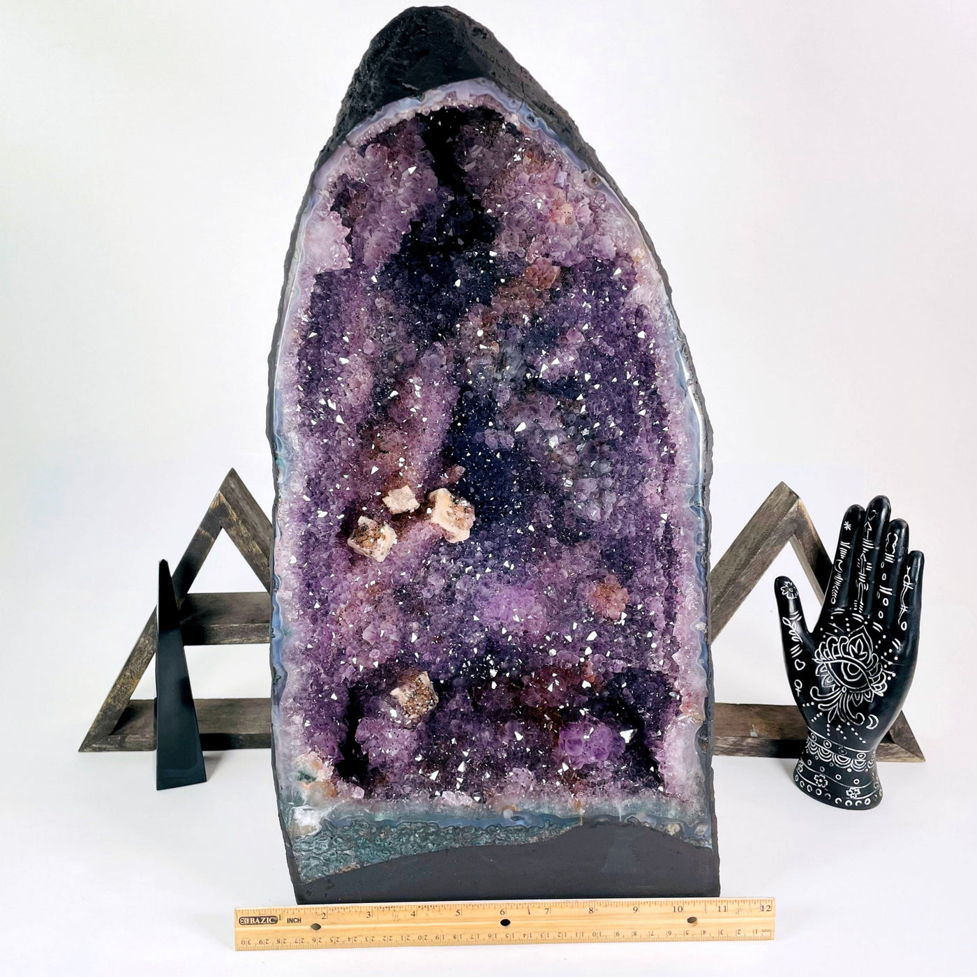 front of amethyst cave geode with horizontal ruler for width reference