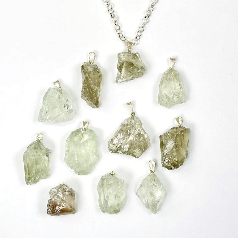 green amethyst spread out and one  on a chain