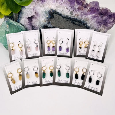crystal point earrings displayed to show the differences in the stones available 