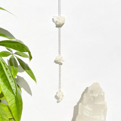 crystal cluster wall hanging on a wall