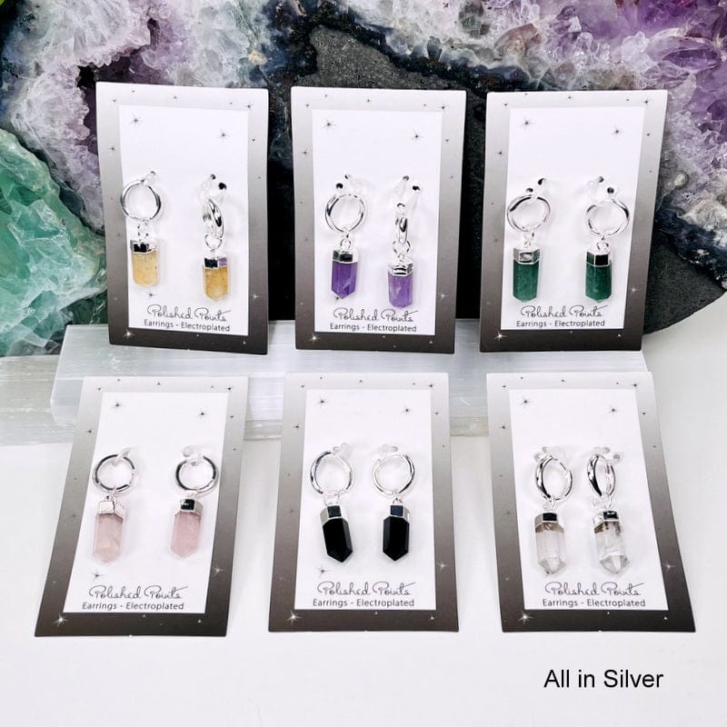 crystal earrings electroplated in silver displayed together. available in citrine, amethyst, green quartz, rose quartz, black obsidian and crystal quartz