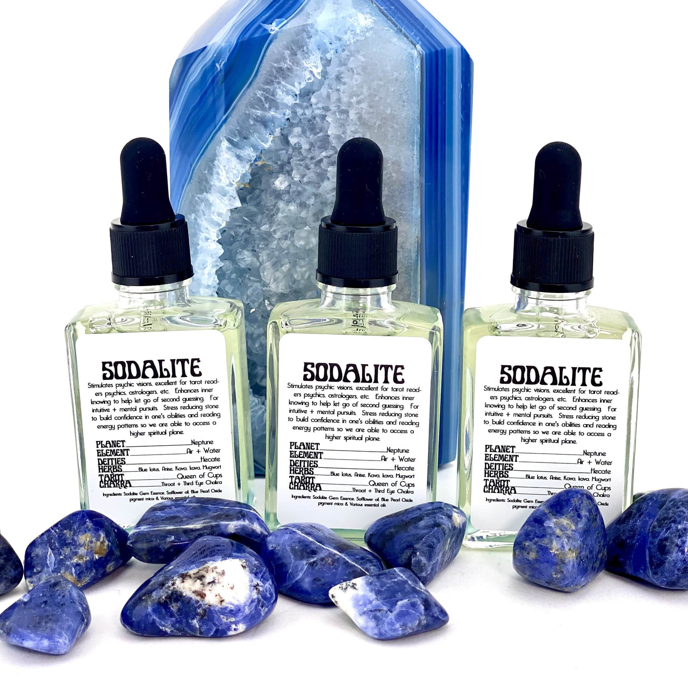 three sodalite gem essence bottles on display