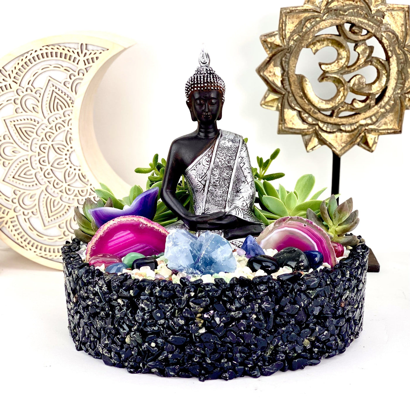 Tumbled Stone Bowl  with buddah and plants in it