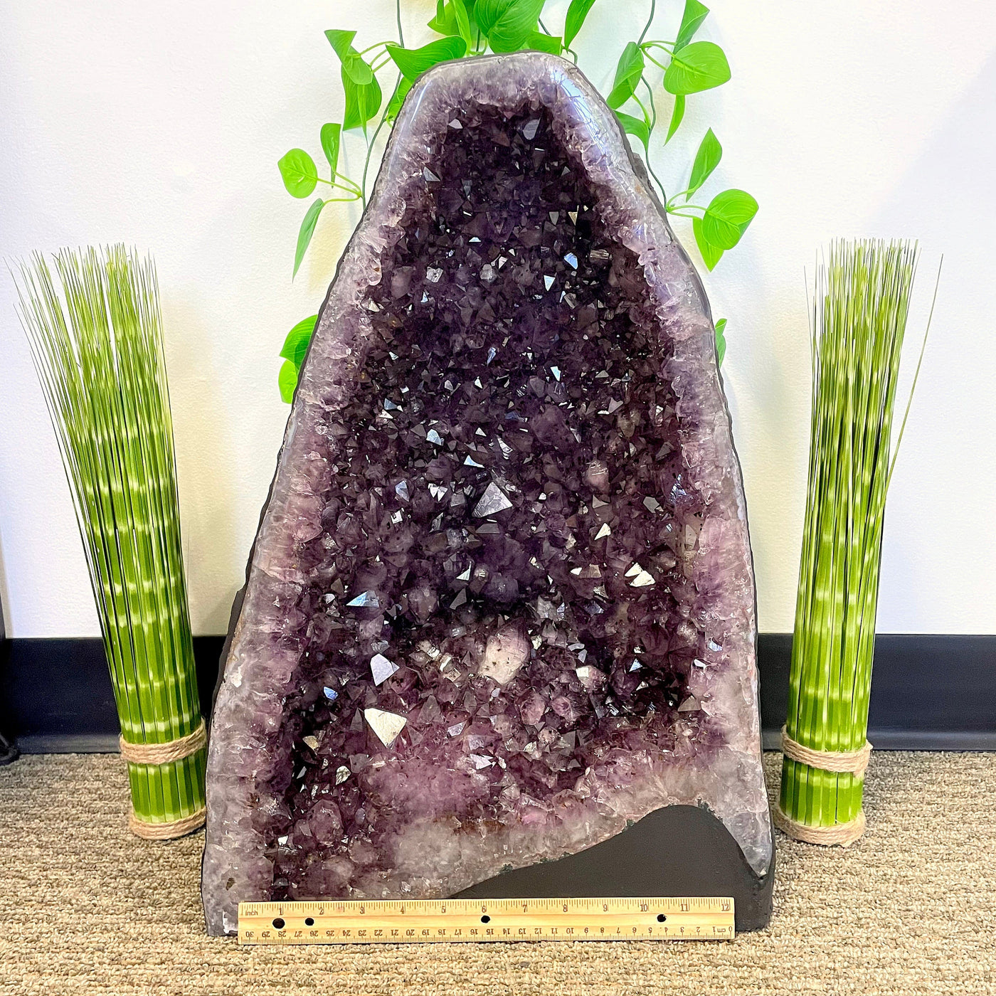 front of amethyst cave geode with  horizontal ruler for width reference