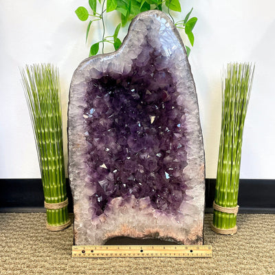 front of amethyst cave geode with horizontal ruler for width reference