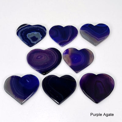 purple agate hearts on a table