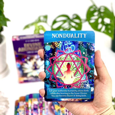 Nonduality Card in Hand on White Background.