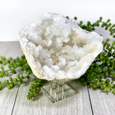 a geode half on top of the Acrylic Crystal display stand