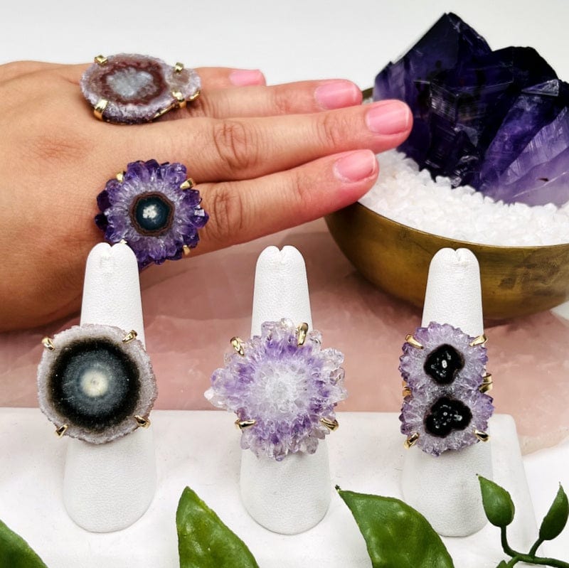 amethyst stalactite rings displayed to show the differences in the color shades and sizes 