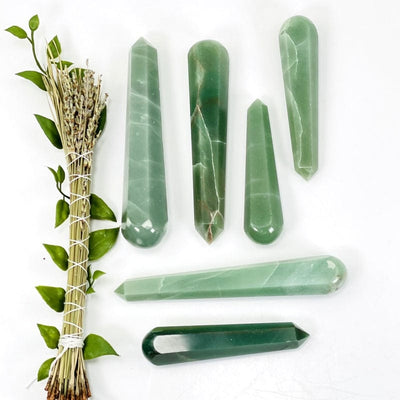 different angles of green quartz polished massage points