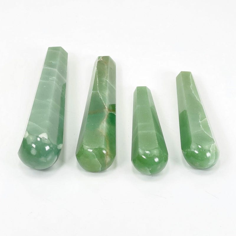 close up of  rounded massage end on green quartz polished massage points