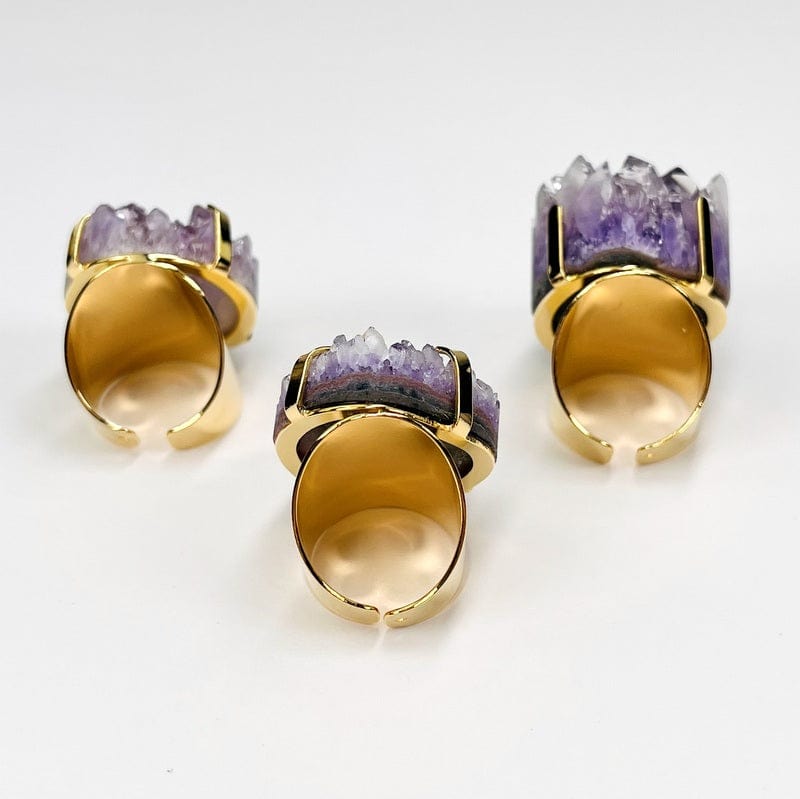 back view of the amethyst clusters on a cigar band style ring 