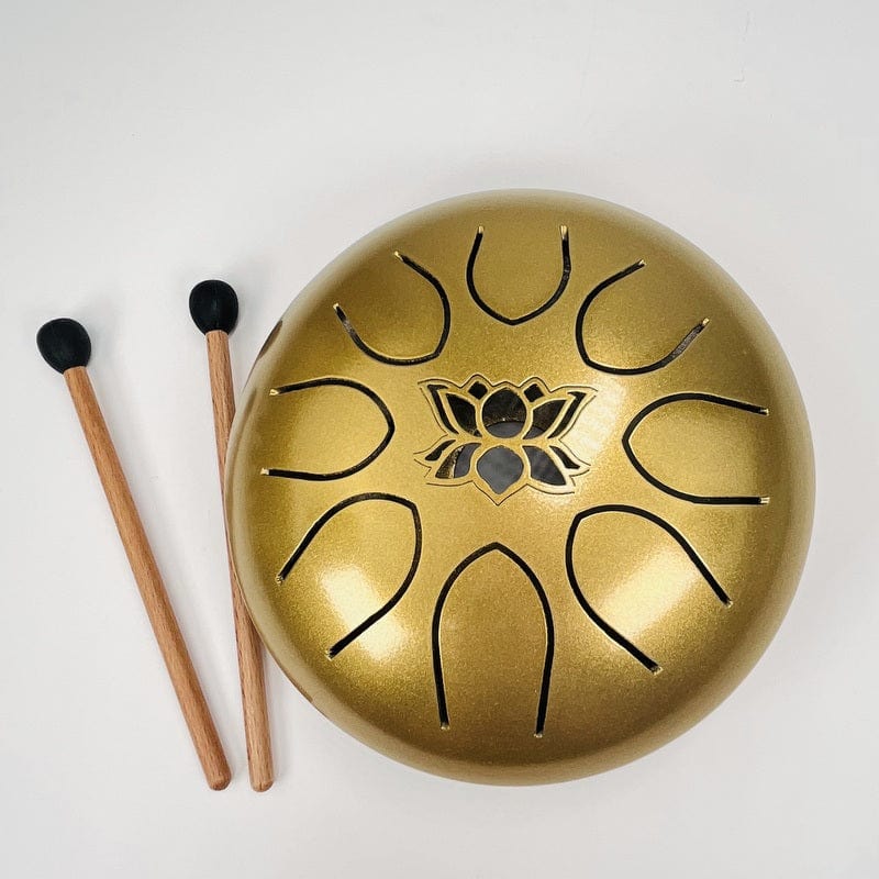 tongue drum with wooden mallets 