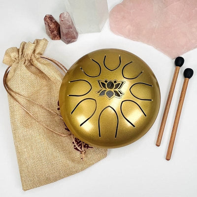 golden tongue drum comes with rubber mallets and a carrying bag 