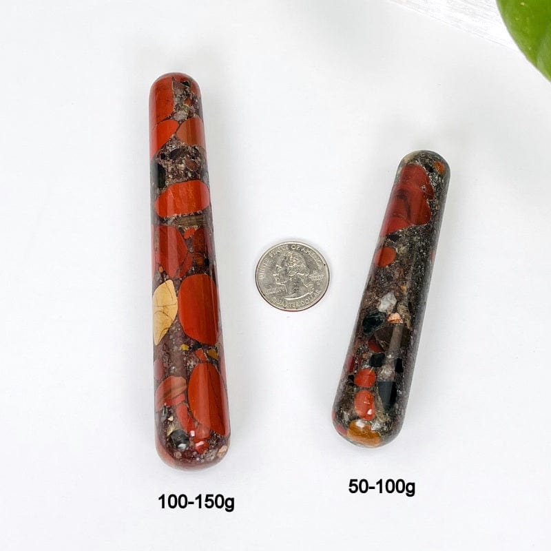 jasper massage wands next to a quarter for size reference and the weight in grams 