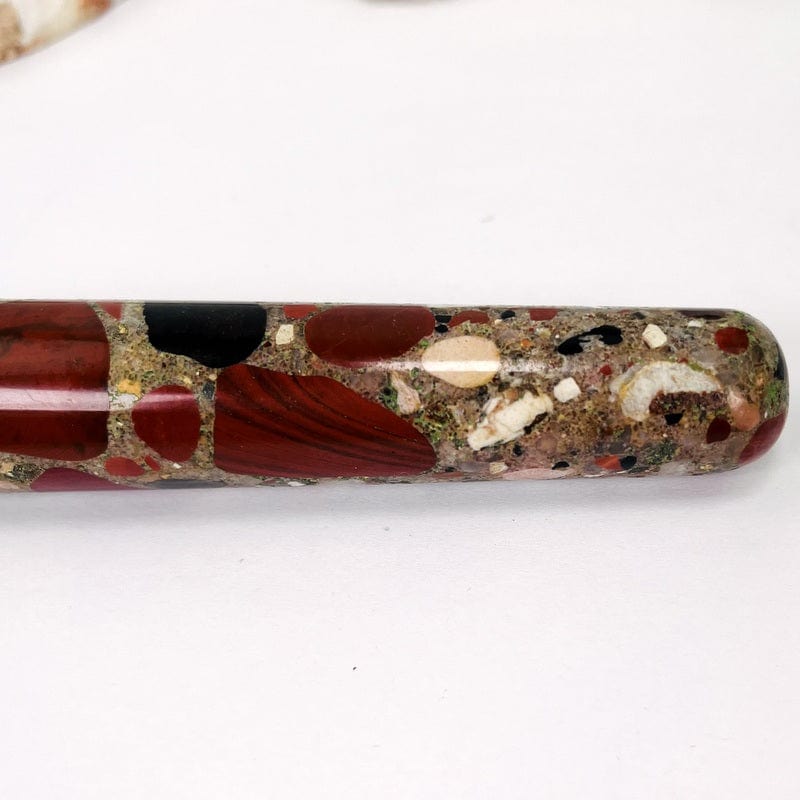 close up of the textures within the red jasper massage wand 
