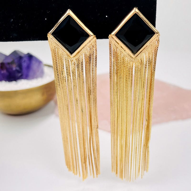 crystal earrings displayed to show how the fringe dangles 