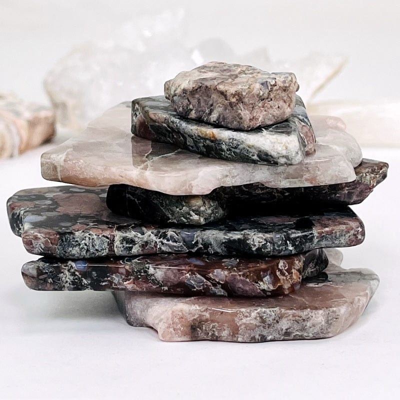 rhyolite semi-tumbled stone slabs stacked on top of each other displaying the different thicknesses within the slabs 