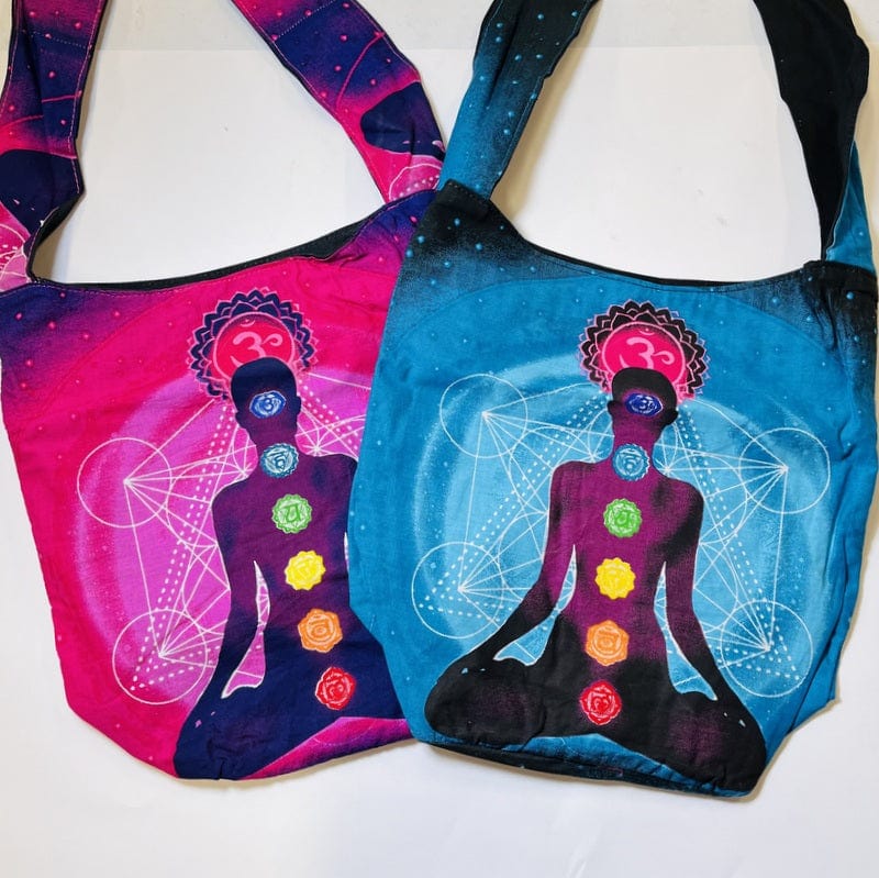 A pink and a blue chakra bag on a white background.