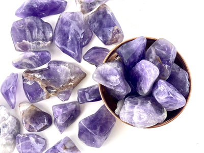 1/2 lb Amethyst Tumbled Stones in bowl (bowl not included)
