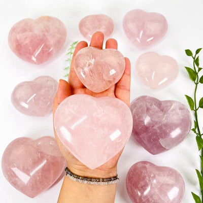 rose quartz puff hearts in hand for size reference 