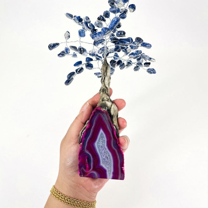 pink geode tree with sodalite top in hand for size reference 