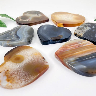 side shot of the natural agate hearts to show the different thicknesses 