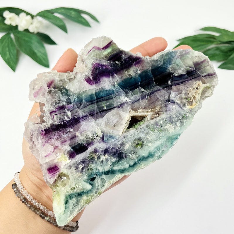 AA grade fluorite slab in hand showing the large option