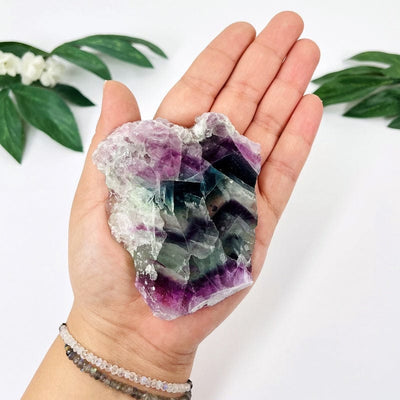 AA grade fluorite slab in hand showing the extra small option 