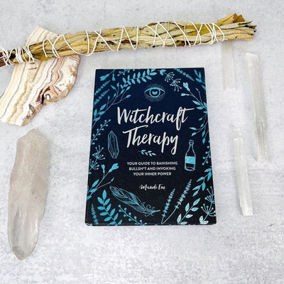 front cover of the witchcraft therapy book by mandi em