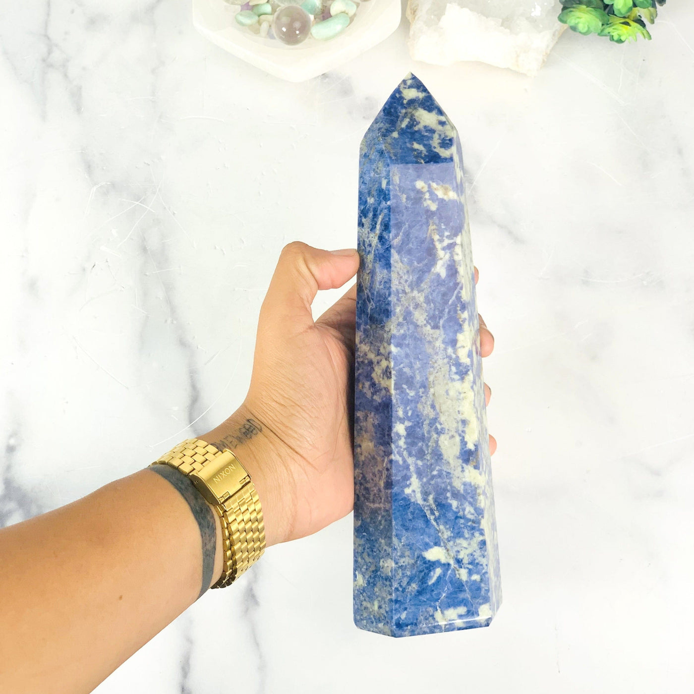 Sodalite Polished Tower Point on hand