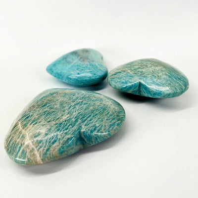 side view of the amazonite hearts to show the thickness 