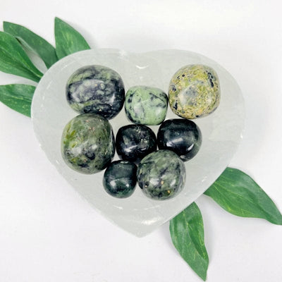 1/2 LB of nephrite tumbled stones being used as home decor 
