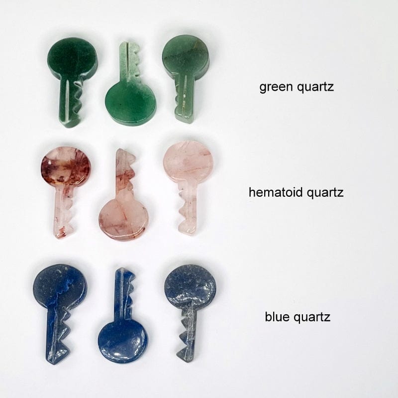 multiple green quartz, hematoid quartz and blue quartz keys showing the differences in the gems