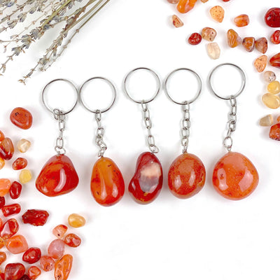 tumbled carnelian keychains in a row