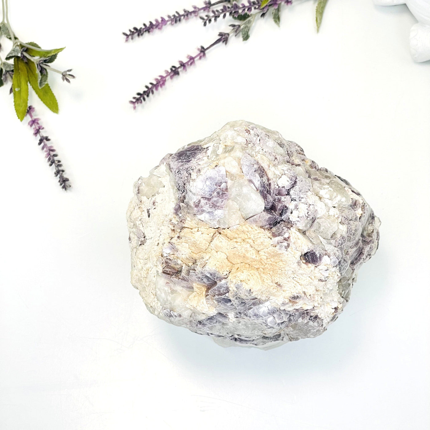 A top view of the beautiful Lepidolite Mica Quartz on white background