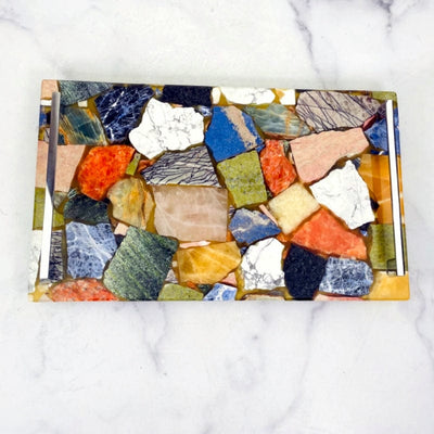 overhead view of mosaic multi-stone platter laying flat