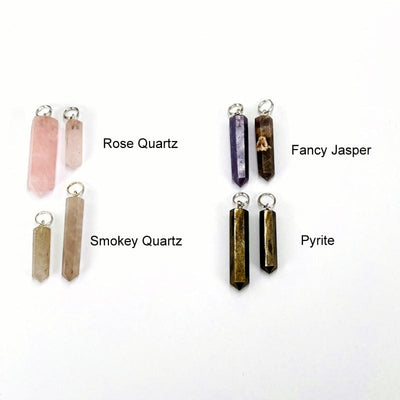 close up of the rose quartz, smokey quartz, fancy jasper and pyrite gemstone pendants with silver bail 
