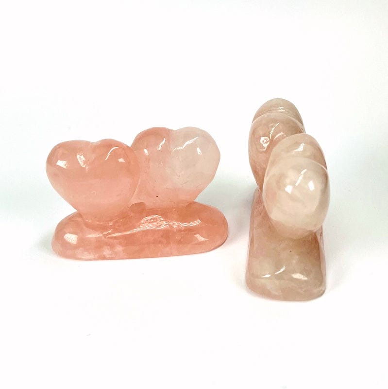 front and side view of the rose quartz double hearts 