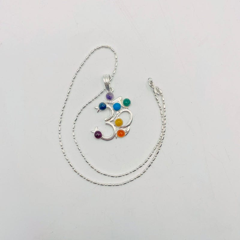chain wrapped around chakra om pendant necklace for length reference