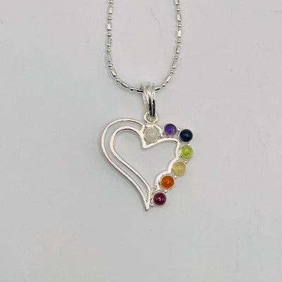 close up of chakra heart pendant