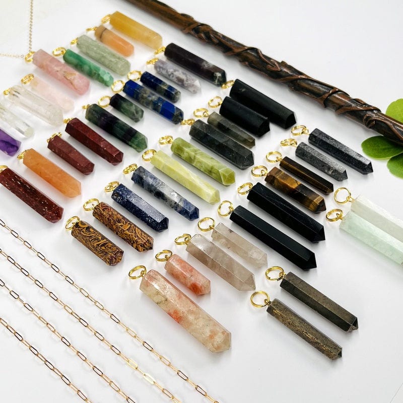 pencil point gemstone pendants with gold circle bails from a different angle to show the differences in sizes 