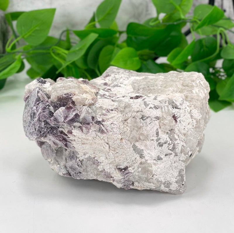 different view of the purple lepidolite with flashes of mica cluster to show texture