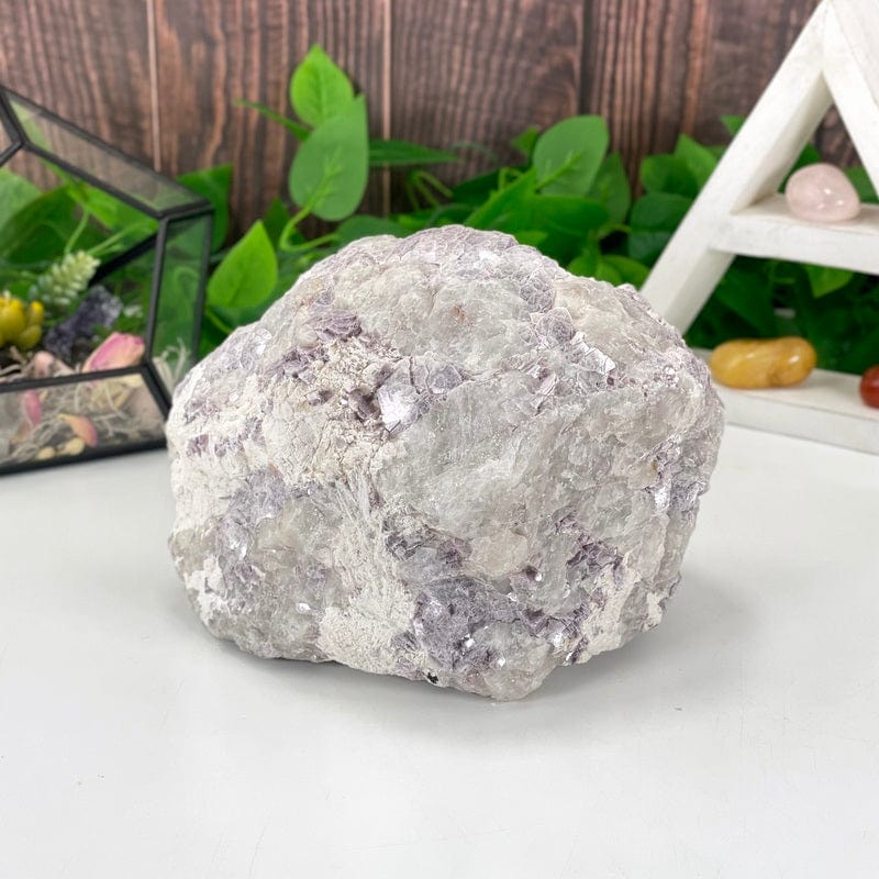 side picture showing the purple lepidolite with flashes of mica