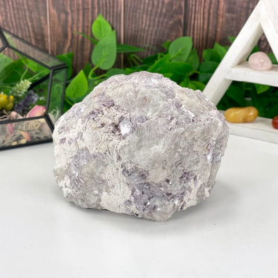 side picture showing the purple lepidolite with flashes of mica