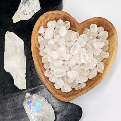 tumbled crystal quartz gemstones in a bowl used as home decor