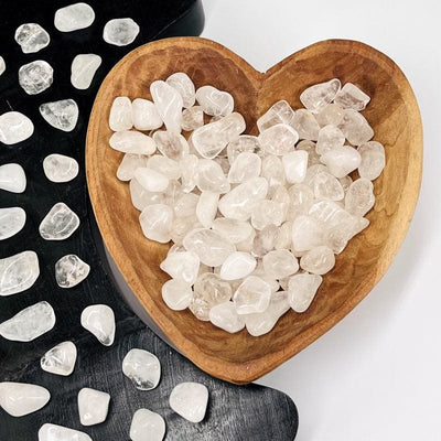 tumbled crystal quartz gemstones in a bowl used as home decor 